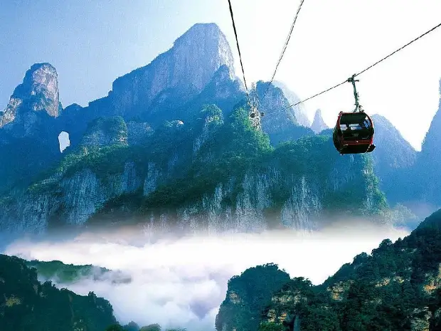 Home 6 Huangshizhai, a renowned attraction in Zhangjiajie, offers the experience of an aerial cable car.