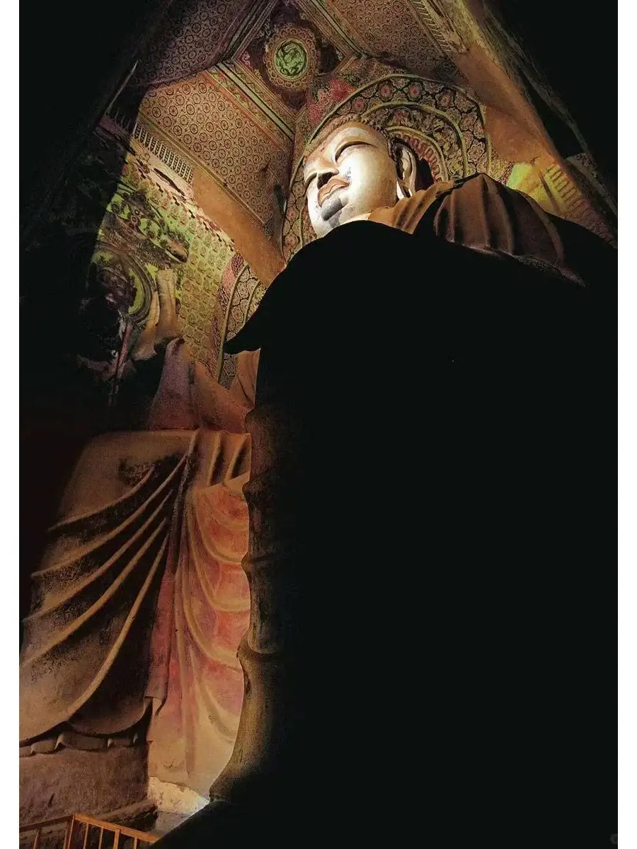 What is the significance of the Mogao Caves? 10 Image of the Mogao Grottoes Giant Buddha Cave