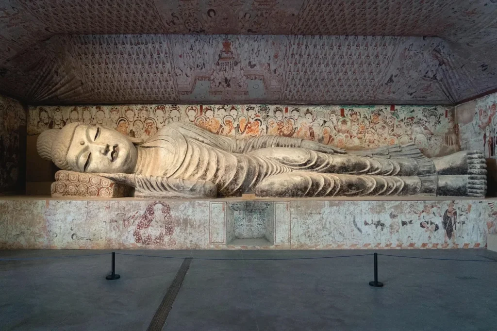 What is the significance of the Mogao Caves? 12 Mogao Grottoes Nirvana Cave Image